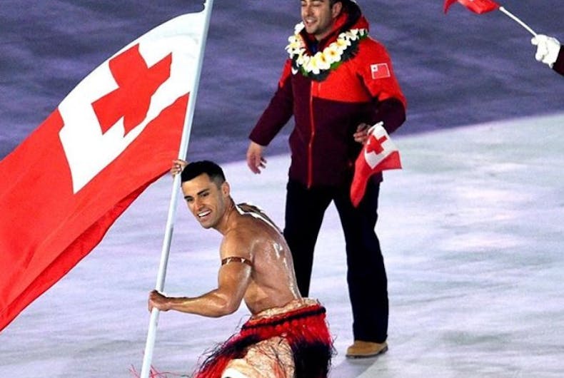tonga-flag-bearer oiled shirtless tonga flag bearer