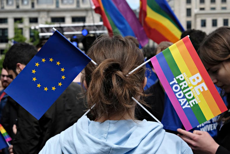 EU-European-Union-rainbow-flag Participant has Rainbow and European flag in his hair during the Belgian Gay Pride parade in Brussels Belgium on May 20, 2017