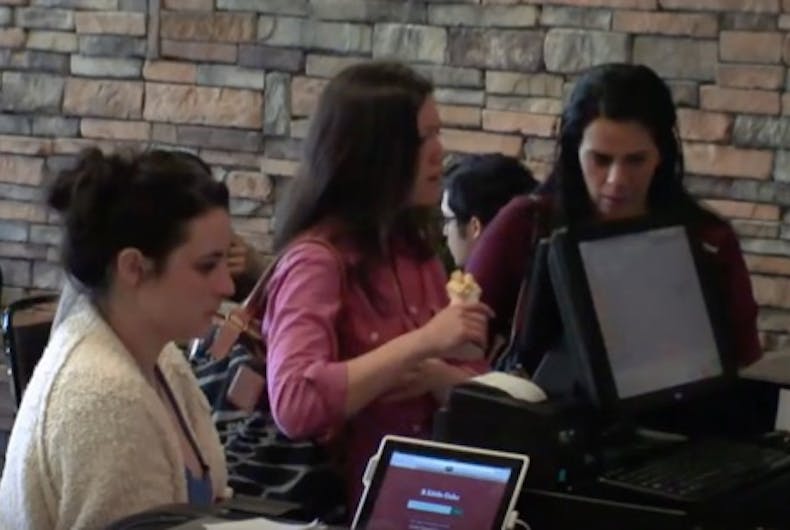 WWYD-antigay-baker A customer looks on as an actor pretending to be a baker refuses to serve a lesbian couple. The couple were also actors.
