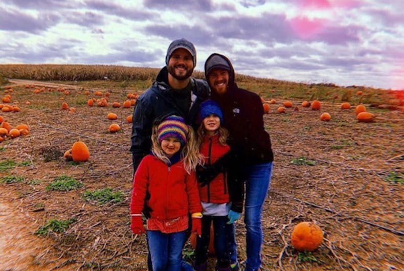 Dads-daughters-pumpkins It may be a chilly day, but these two dads are leaping into fall with their daughters.