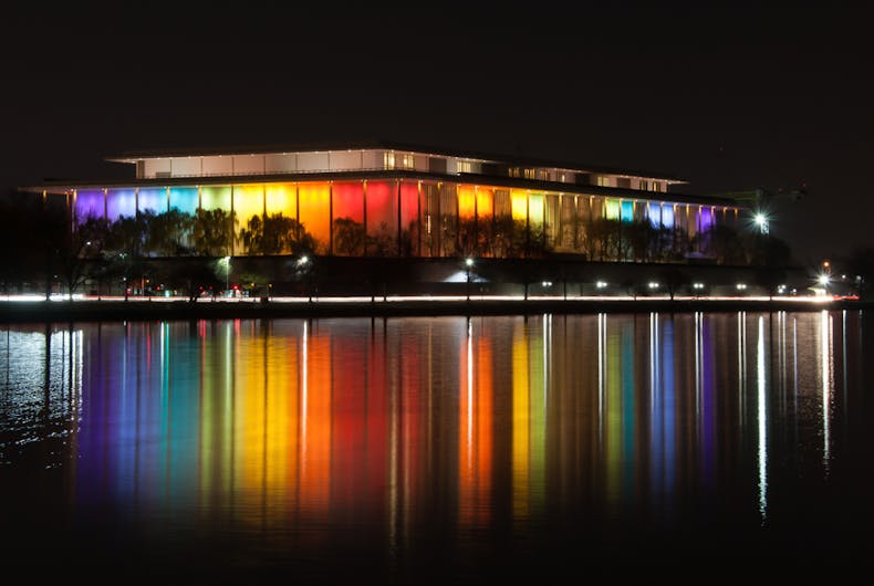 The Kennedy Center for the Performing Arts is lit up in rainbow colors for the Kennedy Center Honors in Washington DC on December 4, 2017