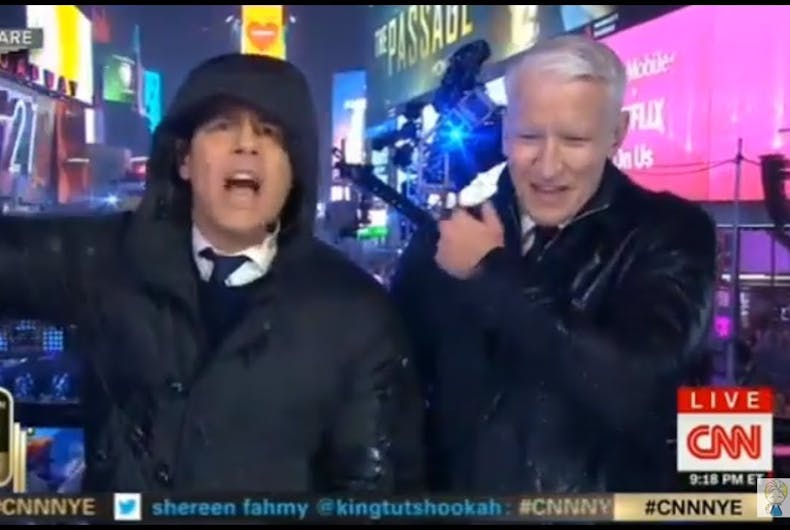 Andy Cohen and Anderson Cooper hosting CNN's annual New Years Eve broadcast from Times Square.