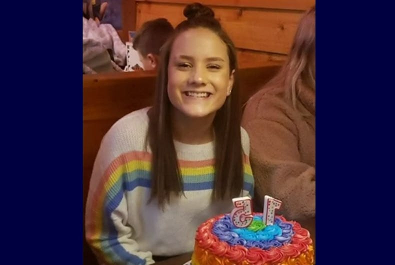 Kayla Kenney in the rainbow sweater