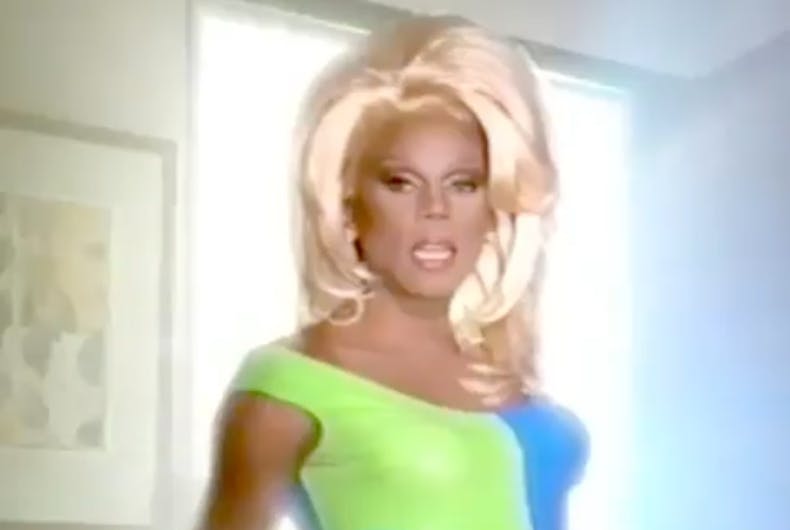 RuPaul in a blue and green dress